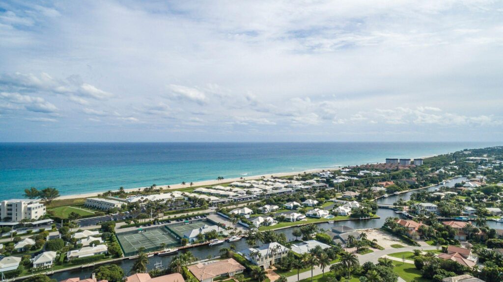 A view of the ocean and beach from above.